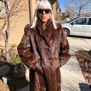 Full length stenciled rabbit coat. Excellent condition. Size 6-8.